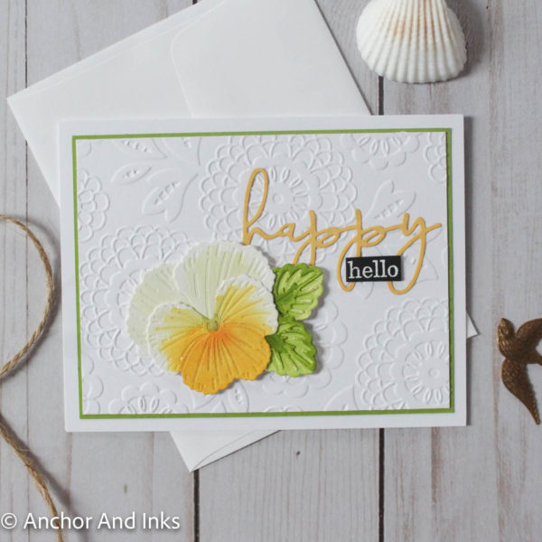 A "happy hello" card featuring a single yellow and white pansy flower