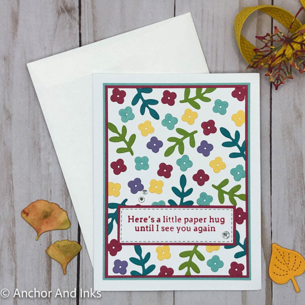 sending a paper hug card with mini flower background
