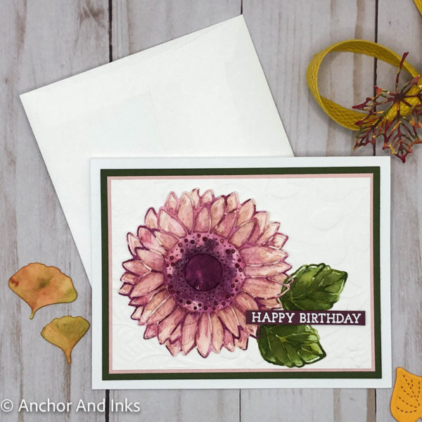 a mauve-colored sunflower birthday card