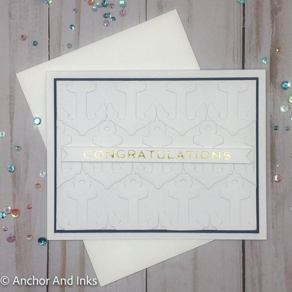 greeting card with dimensional anchor background and gold foil congratulations