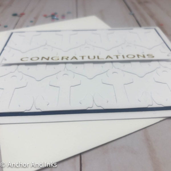 greeting card with dimensional anchor background and gold foil congratulations side view