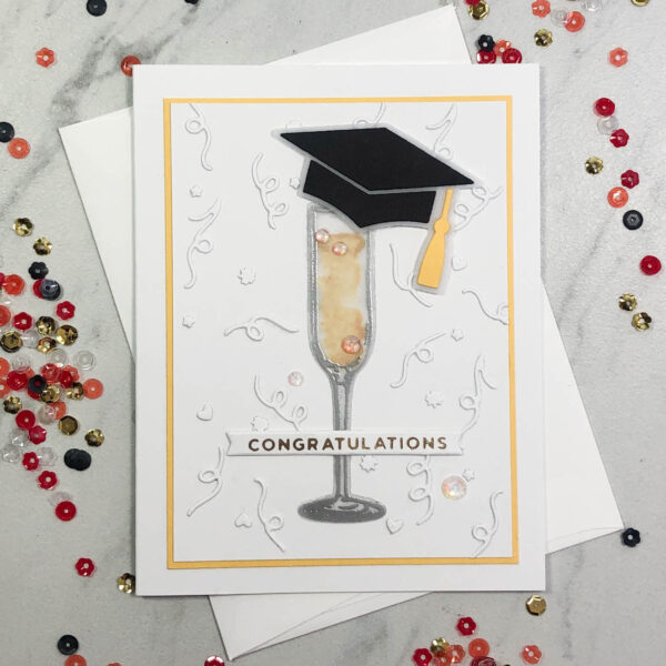 champagne flute and grad cap congratulations